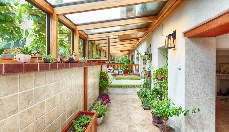 金堂木為江蘇飛翔置業提供鋁木陽光房案例